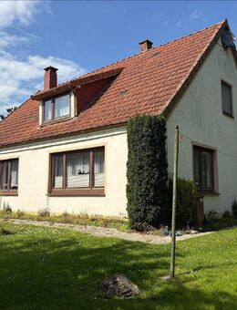 Einfamilienhaus mit Nebengebäude und großem Grundstück in Butjadingen-Tossens - Butjadingen