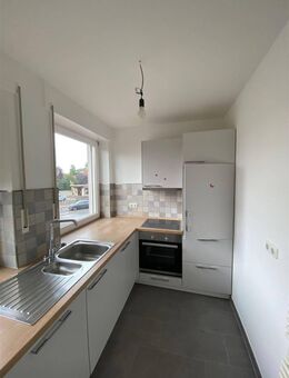 Moderne 2 ZKB-Whg mit Einbauküche & Balkon in zentraler Lage von Wagenfeld - Wagenfeld