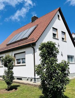 Ihr neues Zuhause im Grünen! Fortlaufend modernisiertes, sehr gepflegtes Haus mit Garage und sonnigem Garten mit Baumbestand - Haßfurt