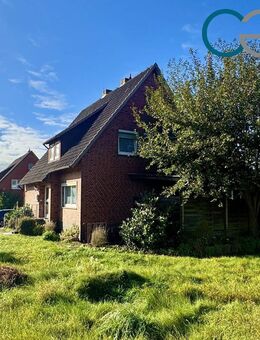 Charmantes Mehrfamilienhaus mit drei vermieteten Wohneinheiten / 2 Garagen / Balkon in Liebenau! - Liebenau (Niedersachsen)