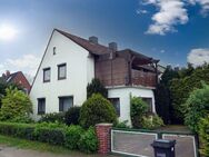 Achim-Bierden: Individuelles Ein- bis Zweifamilienhaus mit Garage, Dachterrasse und hübschem Garten - Achim