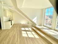 1- Zimmer- Dachgeschosswohnung - ERSTBEZUG - Frei ab 1.7.2025 Mit Fahrstuhl und Stellplatz - Hannoversch Münden Zentrum
