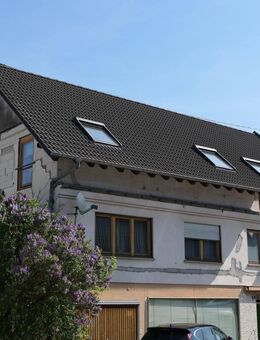 Zweifamilienhaus mit ELW und Gewerbeeinheit - Langenenslingen