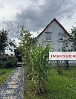 IMMOBERLIN.DE - Charmantes Einfamilienhaus mit Ausbaupotenzial, Südwestgarten & Garage in ländlicher Lage - Britz