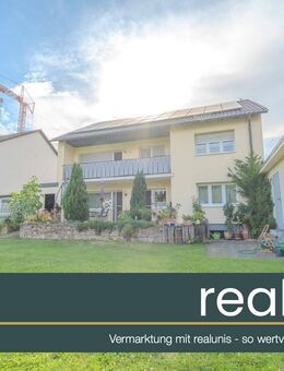 Solides 2-Familienhaus mit Wärmepumpe, PV & Entwicklungspotenzial - realunis - Neulußheim