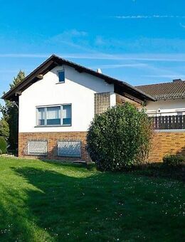 Großzügiger Winkelbungalow auf sehr großem Südwestgrundstück in guter Lage Groß Karbens - Karben