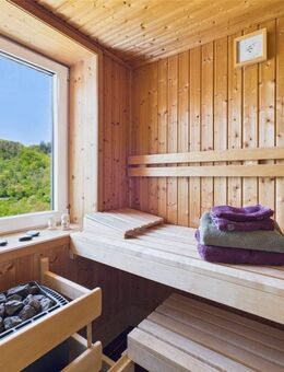 Modernes Wohnen auf hohem Niveau: Exklusive Eigentumswohnung mit Balkon, Sauna und Garage! - Arzbach