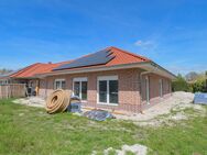 6576 - Nachhaltig leben, stilvoll wohnen - Energieeffizienter Neubau-Bungalow mit Garage - Edewecht