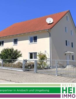 Gepflegtes Zweifamilienhaus mit großen 4-Zimmer-Wohnungen am Stadtrand - Ansbach