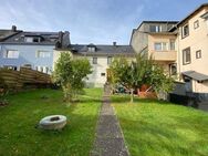 Idar-Oberstein: Großzügiges Reihenmittelhaus mit vermieteter Wohnung und großem Garten - Idar-Oberstein