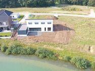 Ebenerdiger hochwertiger Pultdach-Bungalow in einzigartiger Lage mit direktem Seeblick! - Herzlake