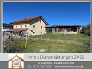 Wohnhaus mit sep. Einliegerwohnung und zwei Garagen (Ulbering) - Wittibreut