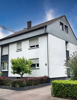Wohnen & Vermieten unter einem Dach: Mehrfamilienhaus mit Garten, Garage & Potenzial - Durmersheim
