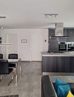Attraktive 3 Zimmer-Wohnung mit 2 Sonnenterrassen, Wintergarten, 2 Außen-Stellplätzen in Nieder-Olm - Nieder-Olm