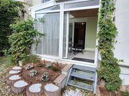 2,5 Zimmer EG-Wohnung mit neuer Einbauküche, Wintergarten & Gartenanteil - Neulußheim