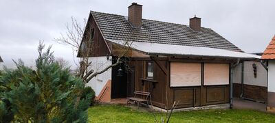 Ein- bis Zweifamilienhaus mit Balkon und großem Garten in bester Lage