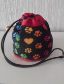 Leckerli - Beutel bunte Pfötchen mit rot in 59425