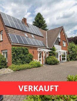 Freistehendes Haus mit Garagen und zusätzlichem (Baugrundstück) in begehrter Lage in Uelsen - Uelsen