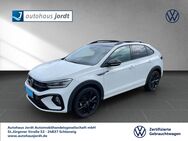 VW Taigo, 1.0 TSI OPF R-line Black Style, Jahr 2024 - Schleswig