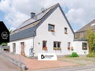 Meerbusch-Bösinghoven: Großzügiges Zwei-Parteienhaus mit ca. 260 qm Wohn- und Nutzfläche - Meerbusch