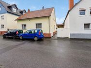 Freistehendes Einfamilienhaus mit Hof und Nebengebäuden im Ortskern in Kleinostheim - Kleinostheim