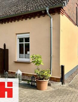 Geräumiges Wohnhaus mit Garage und Doppelcarport in zentraler Wohnlage von Schwarmstedt - Schwarmstedt