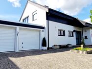 2-Familienhaus mit Souterrainwohnung und Doppelgarage - Rodenberg