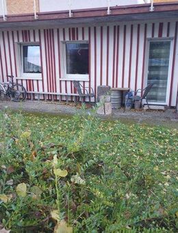 Top-Gelegenheit! Schöne Eigentumswohnung mit Terrasse und Garten in Burgsponheim zu verkaufen - Burgsponheim