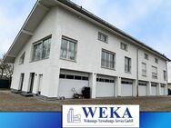 NEUWERTIG - Sehr moderne 4-Zimmerwohnung mit Wintergärten und 3 Garagen mit Gewerbeflächen (Büro oder Lager) - Quakenbrück