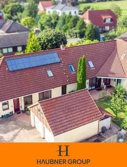 ÜBER 6% RENDITE möglich! Attraktives Mehrfamilienhaus mit 3 separaten Wohnungen und Doppelgarage - Oyten