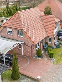 Vermietetes Einfamilienhaus mit Garage, Carport, überdachter Terrasse und großem Gartenhaus! - Niederlangen
