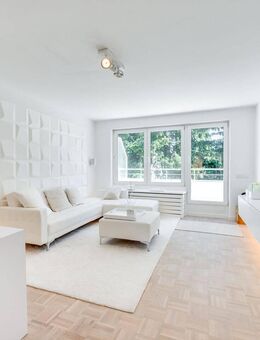 AIGNER - Lichtdurchflutete Penthousewohnung mit umlaufenden Balkon und Nähe zum Perlacher Forst - Unterhaching