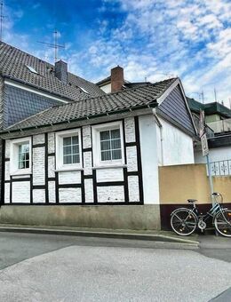 Vielseitige Immobilie: Einfamilienhaus mit Appartement und vermietetem Ladenlokal in zentraler Lage - Sprockhövel