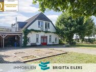 Zum Fertigstellen in Etelsen: Teilsaniertes Bauernhaus mit zwei Einheiten, Nebengebäude und Carport - Langwedel (Niedersachsen)