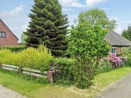 Familiengerechtes Einfamilienhaus mit Einliegerwohnung und großem Garten - Buchholz (Landkreis Dithmarschen)
