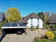 Exklusives Zweifamilienhaus auf großem Grundstück mit Pool in Mulmshorn - Rotenburg (Wümme)