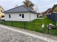 Bungalow-Neubau mit Carport in Baulücke in Soltau - Soltau