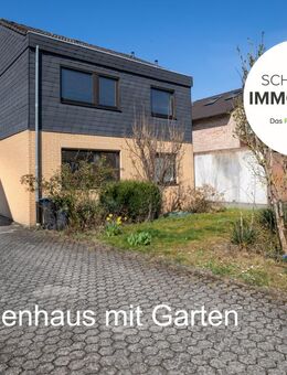 Einfamilienhaus in Urmitz mit Garten & 2x Garagen - Urmitz