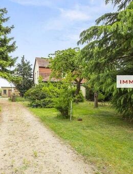 IMMOBERLIN.DE - Attraktives Haus mit sehr viel Gestaltungspotential auf großem Grundstück in Wohlfühllage - Dallgow-Döberitz