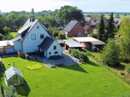 Wohnjuwel mit weitläufigem Grundstück: Modern ausgestattetes EFH in idyllischer Heidelage bei Uelzen - Rätzlingen