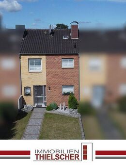 Charmantes Reihenmittelhaus mit schön angelegtem Garten und gutem Raumkonzept in zentraler Lage - Übach-Palenberg