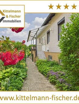 Großzügiges Einfamilienhaus mit 2 Wohneinheiten, Carport und Garten auf Eigentumsgrundstück - Wolfsburg