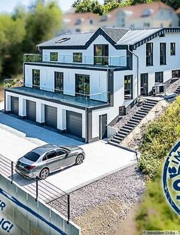 Erstbezug: Moderne Neubau-Erdgeschoss-Eigentumswohnung mit 2 Garagen in Daun-Pützborn - Daun