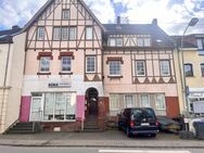 Mehrfamilienhaus in Eppelborn-Dirmingen, 5 Wohnungen+1 Gewerbe / Sanierungsbedürftigt - Eppelborn