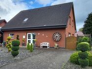 Zweifamilienhaus mit Garage, Carport und Garten in Ramsloh zu verkaufen. - Saterland