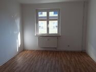 Große 2 Raumwohnung mit Wohnküche im 1. Obergeschoss - Braunsbedra