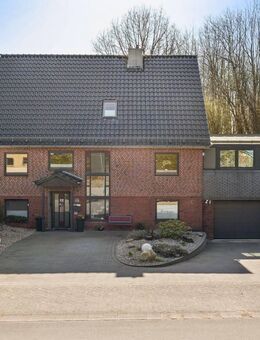 Hochwertiges Einfamilienhaus mit großem Wintergarten, Traumgarten und besonderen Extras in Owschlag - Owschlag