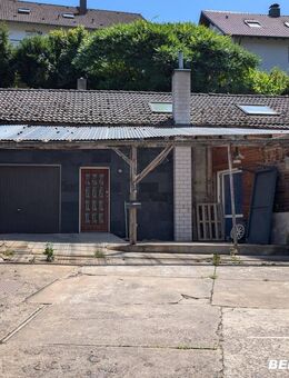 BERK Immobilien - Wohnen mit Potenzial: Unkonventionelle Immobilie in Hausen - Hausen (Landkreis Miltenberg)