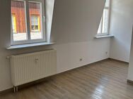 Eine sanierte 2-Zimmer-Wohnung direkt am Marktplatz der Stadt Lößnitz! - Lößnitz