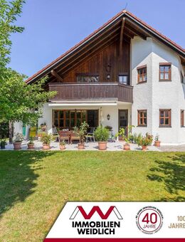 Zuhause in Bestlage - Zwei-Familienhaus mit Gartenidylle und Parkzugang - Haar